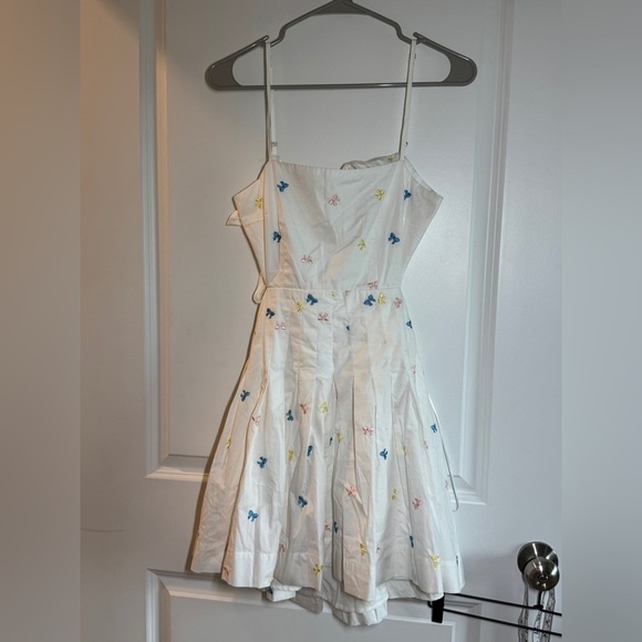 Chic White Backless Dress with Spaghetti Straps - Picture 7 of 13